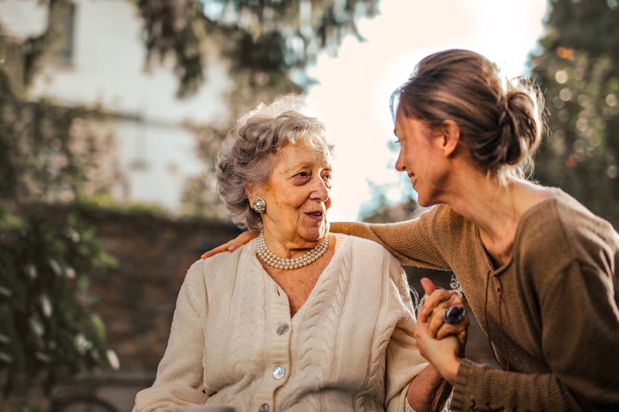 A home care professional spending time with an older adult